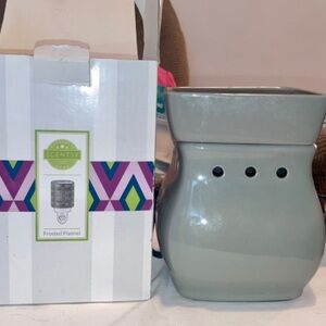 Scentsy warmer used once with brand new bulb.